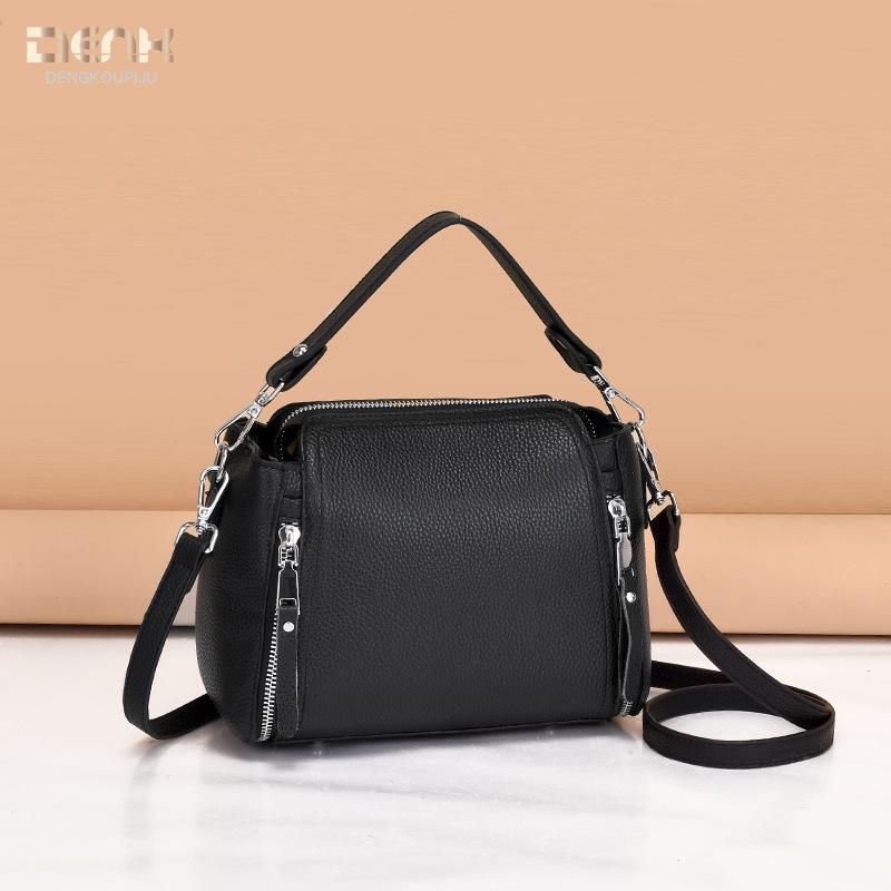 Bag women's new leather women's bag design sense large capacity Korean version portable messenger bag