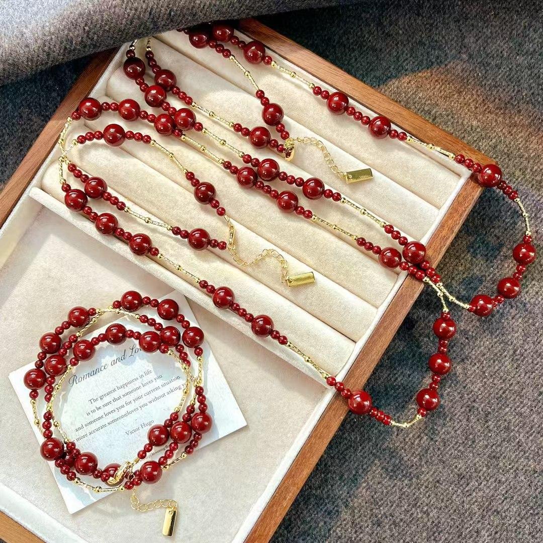 

Vintage High Quality Faux Crystal Ankara Red Pearl Sweater Chain Necklace