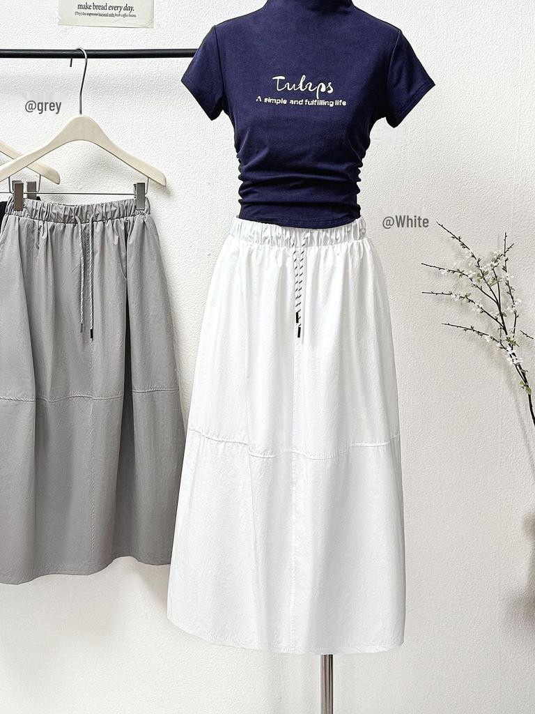2026 Spring/Summer Retro Cocoon Mid-Length Elastic Waist Skirt - Stylish Solid Color Artistic Bud Design