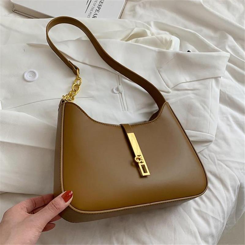 Elegant Solid Color Handbag Shoulder Bag with Golden Tone Clasp Design Versatile for Casual Commuter Wear All Match Armpit Bag