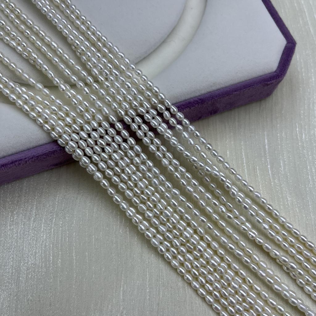 1 pramen, Bílé přírodní sladkovodní perly, Ručně vyráběné rýžové perly pro výrobu šperků DIY řemesla (Korálky 2-3 mm, Délka 36 cm)