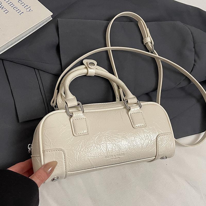 Korean niche simple portable bowling bag women 2025 new versatile foreign style fashion messenger pillow bag