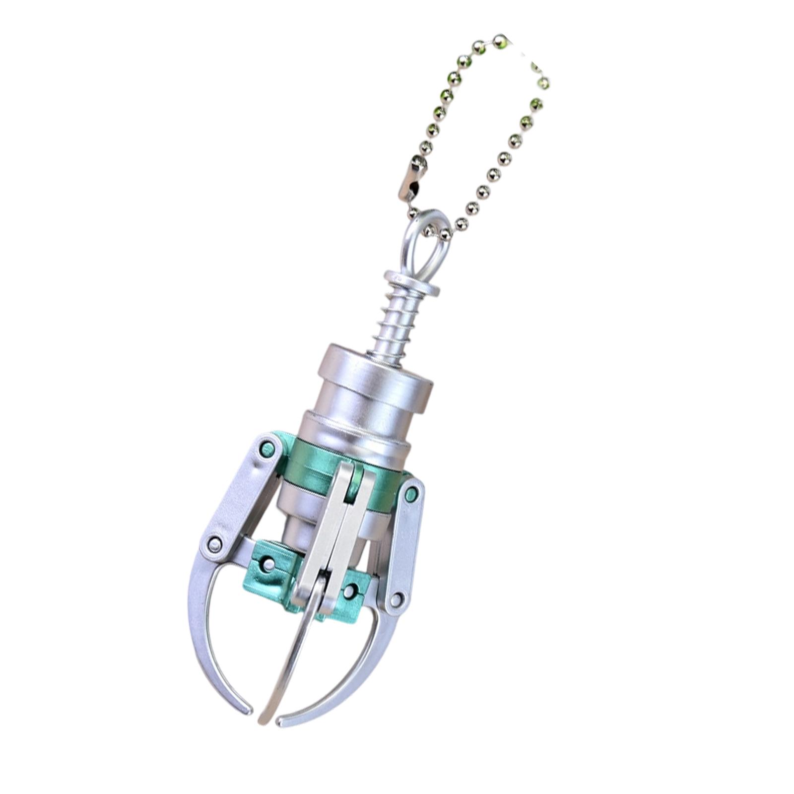 

Брелок в виде когтевого автомата, оригинальная настольная игрушка для снятия стресса и развлечения, идея подарка из прочного экологичного материала зелёный