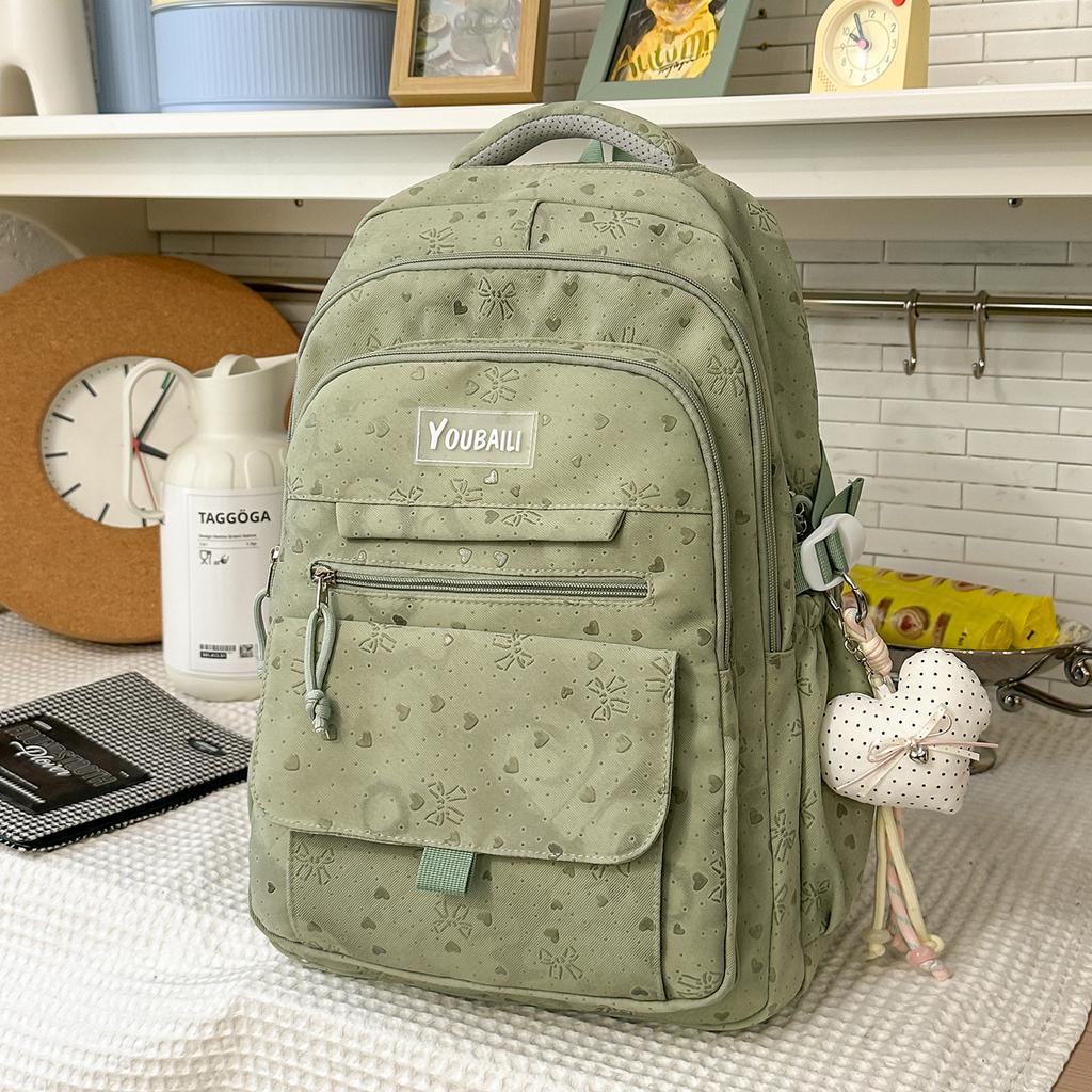 Schoolbag Korean version of high-value bow backpack for junior high school students, large-capacity schoolbag, casual trend, cute backpack.