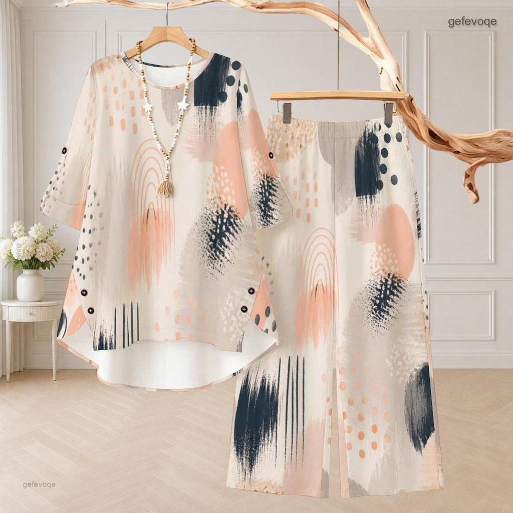 Women Plus Size White Printed Two Piece Set Round Neck Half Sleeve High Low Top Wide Leg Pants