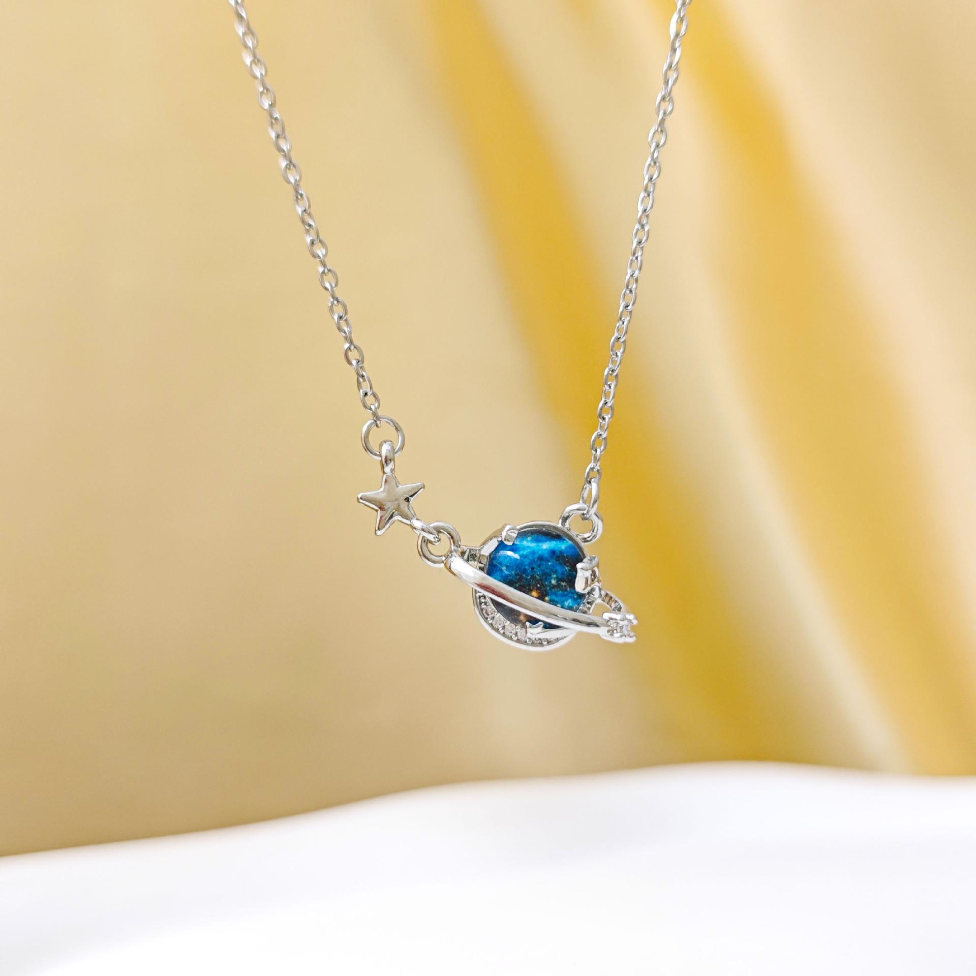 

Luxurious Starry Night Aquamarine Pendant Necklace with Butterfly and Moon Design