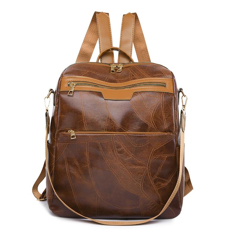 

Поліуретановий рюкзак. Жіночий дорожній рюкзак із кольоровими блоками з китицями. Сумка для комп’ютера великої місткості. Студентський шкільний рюкзак. світло-коричневого кольору