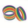 European-American Silicone Rainbow Bracelet: Six-Layer Multicolor Wristband In Red, Orange, Yellow, Green, Blue, and Purple.