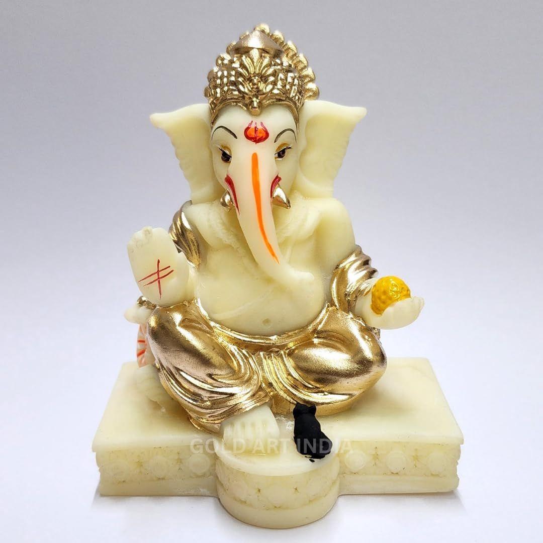 

Gaddi Ganesha Idol for Home Decor | Peach Terracotta Finish with Gold Colour Mukut & Ornaments – 3.5 Inch Ganpati Statue for Car