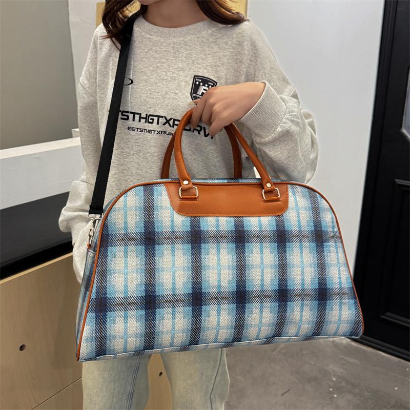 Simple casual nostalgic large-capacity outdoor handbag household seasonal clothing storage luggage