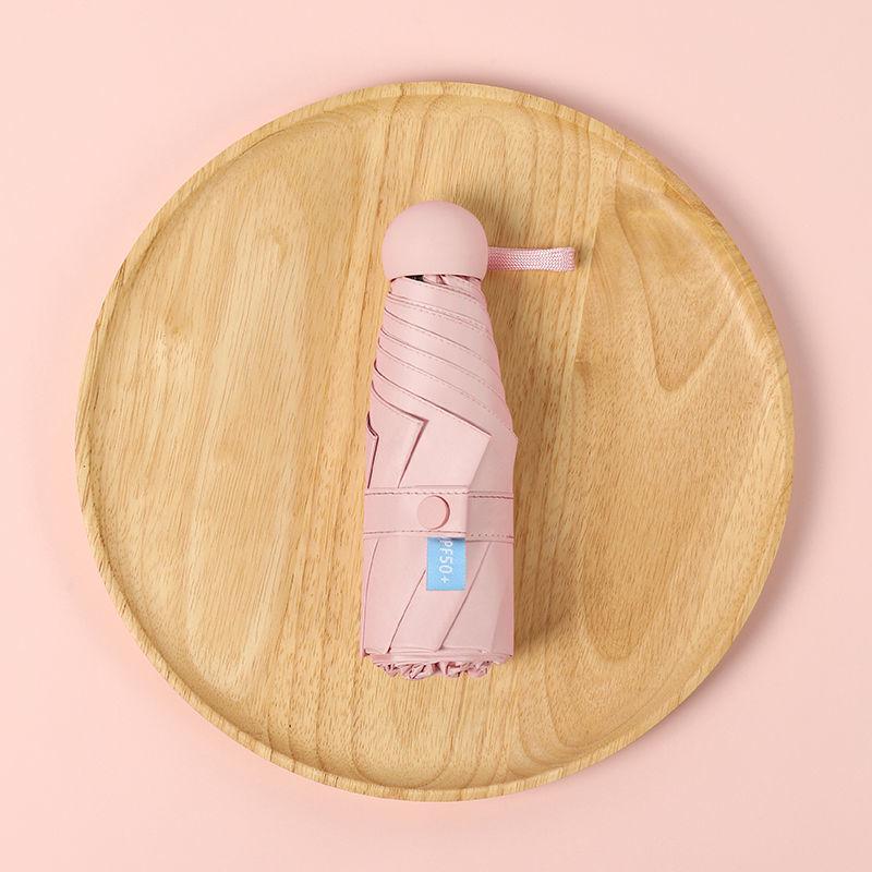 Parasol Capsule Sun Umbrella: 50% Off Mini UV Protection for Women, Dual-Purpose for Sun and Rain.