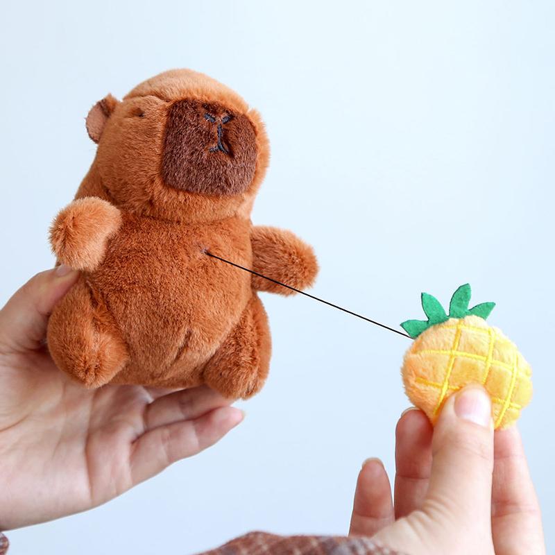 12Cm Cute Plush Capybara Holding Fruit Quick Pull Keychain Toy Cartoon Capybara Fluffty Animal Doll Plush Pendant Accessories