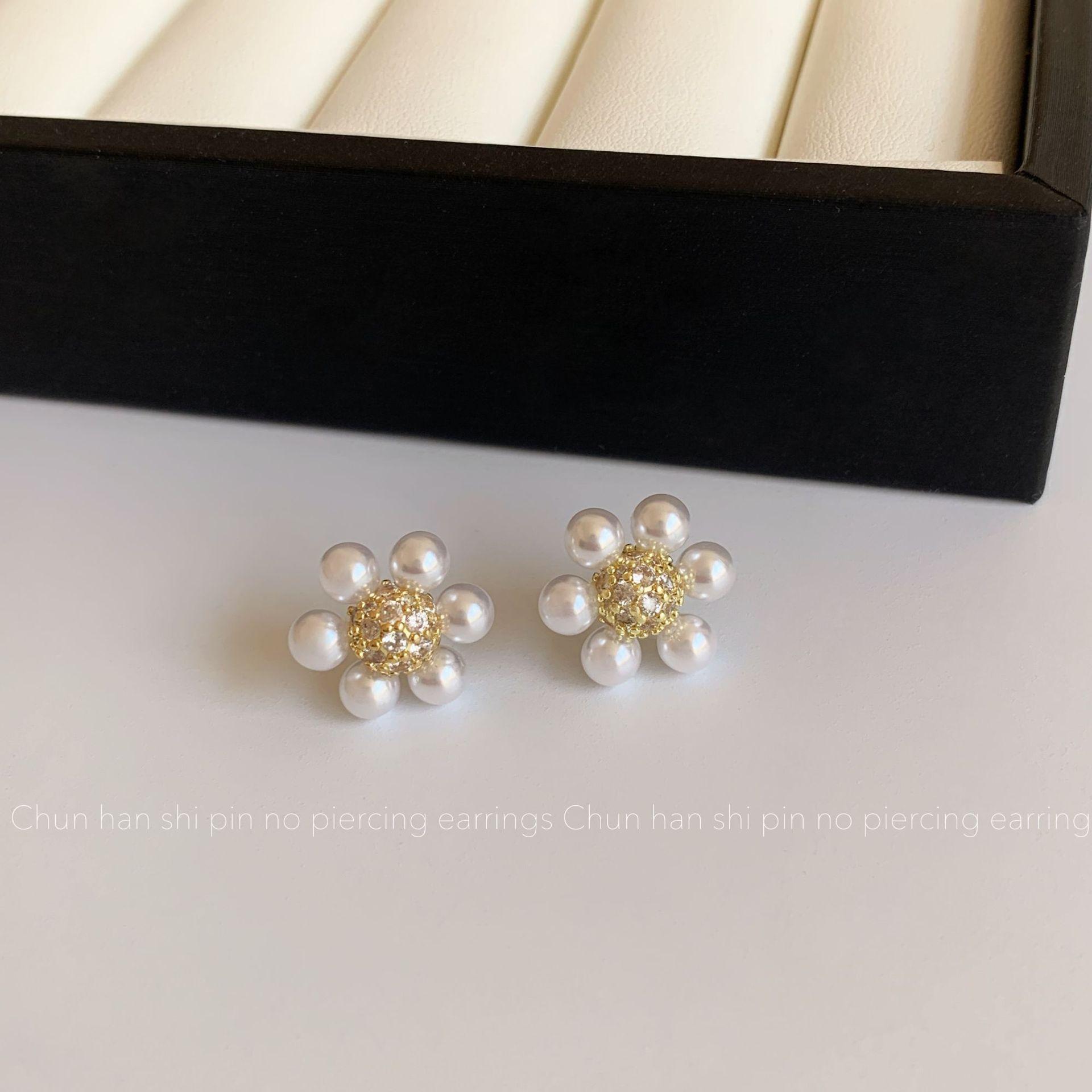 

New pearl flower pearl mosquito coil disc ear clip women s niche high-end stud earrings fashionable versatile light luxury earrings women