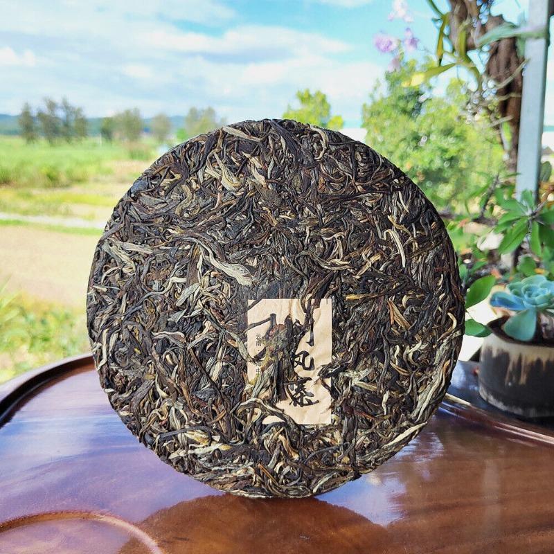 Scraping Walled Pu'er Teekuchen Yiwu Ancient Tree Raw Tea Erster Frühling Yunnan Tee