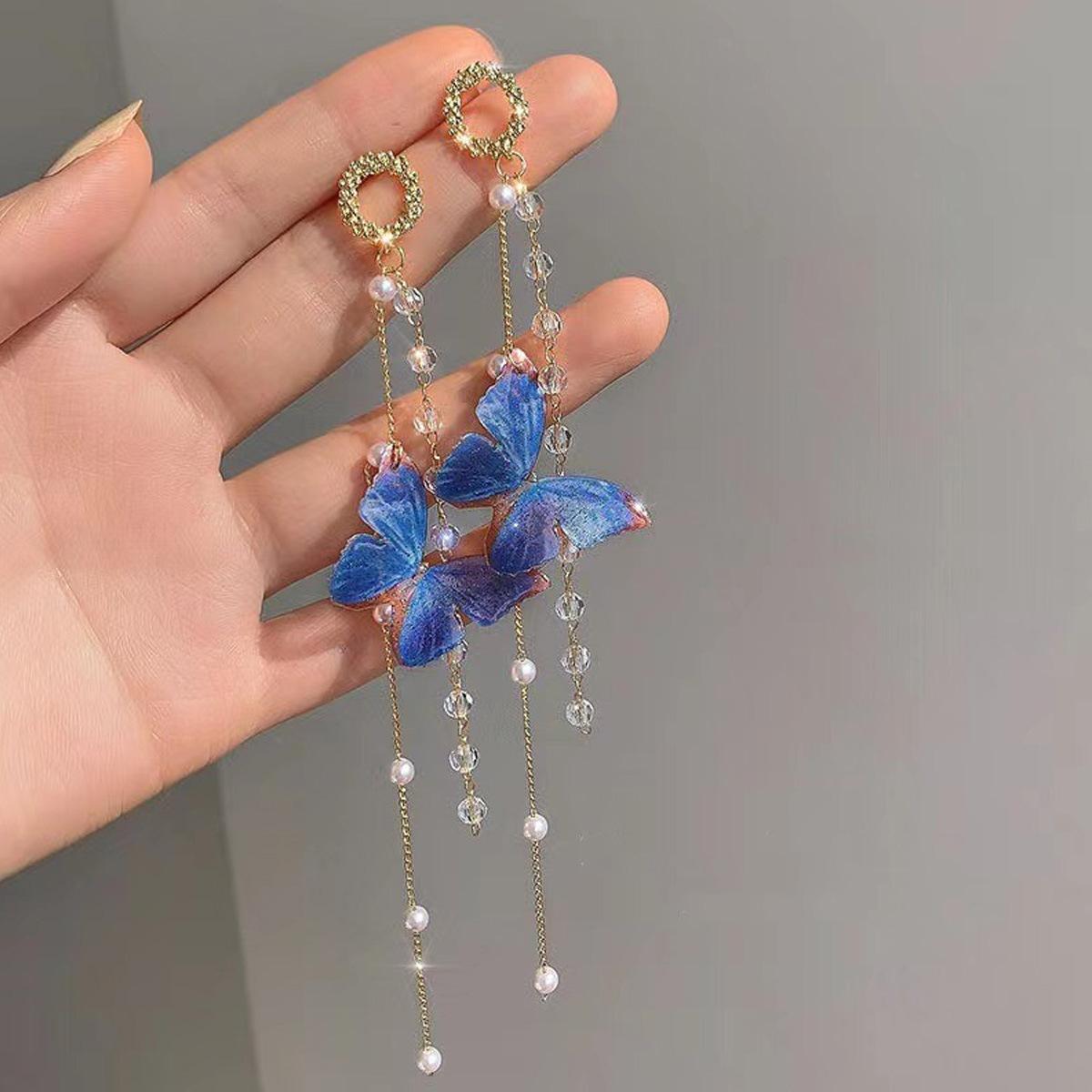 

Модные серьги-кисточки в виде бабочек синий