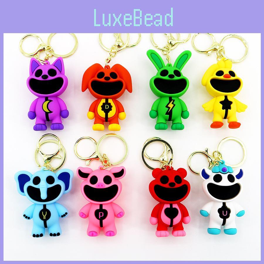 Entzückende lächelnde Kreaturen Bobi Spielzeit 3 PVC-Tier-Schlüsselanhänger Hummerverschluss Orange