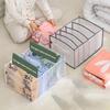 Organisateur de garde-robe avec poignée 5 compartiments Grande capacité Anti-poussière Pliable Rangement Maille Drap Housse de couette Organisateur de vêtements pour chambre