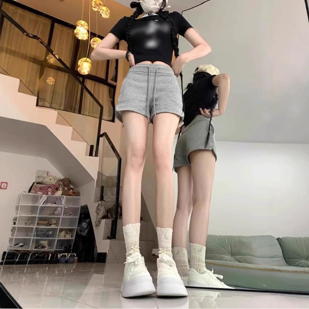 Women's Spicy Girl Black Drawstring Casual Shorts: Autumn Elastic Waist, Slit Straight Leg, Solid Color Fashion.