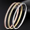 Rose Gold Titanium Steel Starry Bangle with Inlaid Diamonds for Women.
