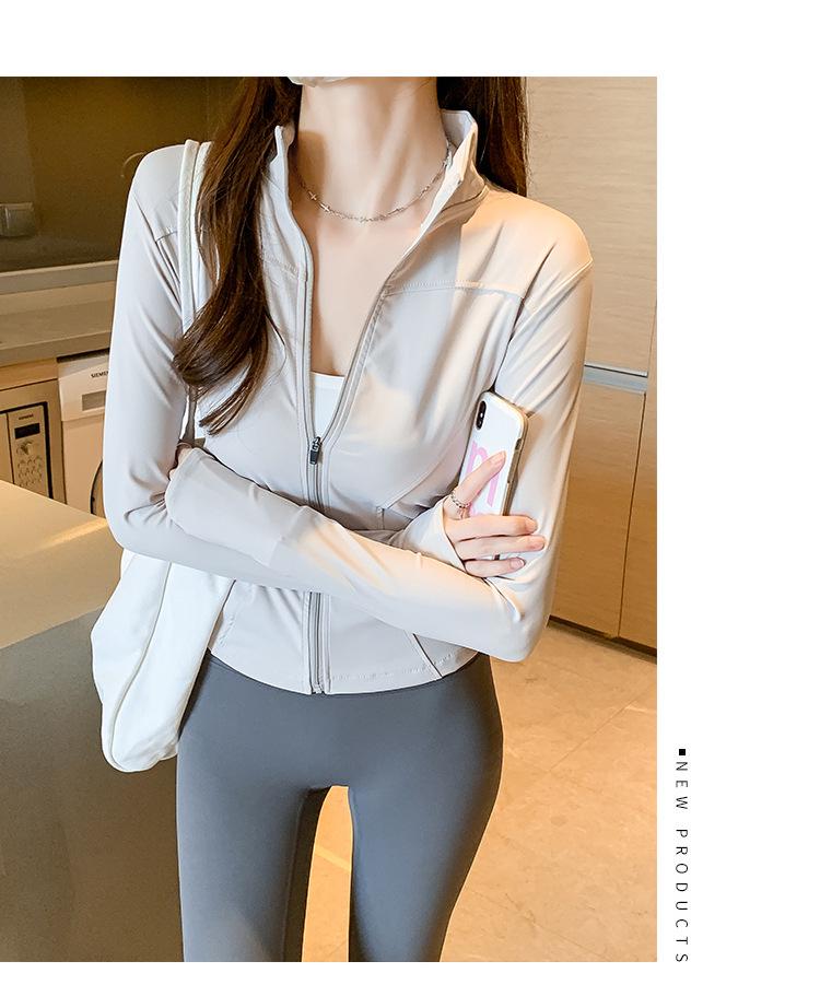 Women's Quick-Dry Stand Collar Fitness Jacket with Zipper - Breathable, Long Sleeve Sports Top for Running, Yoga, Outerwear.