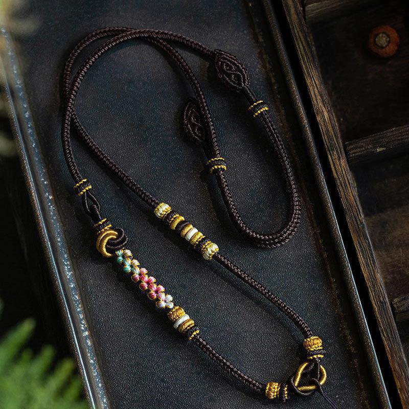 Ręcznie wykonany naszyjnik z wisiorkiem z jadeitu z klamrą Pokoju na sznurku w kolorze kwiatu brzoskwini