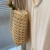 Handwoven Straw Tote Bag with Leather Handles and Open Weave Design Perfect for Summer Beach and Casual Outings