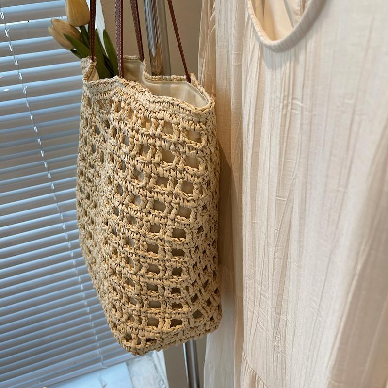 Handwoven Straw Tote Bag with Leather Handles and Open Weave Design Perfect for Summer Beach and Casual Outings