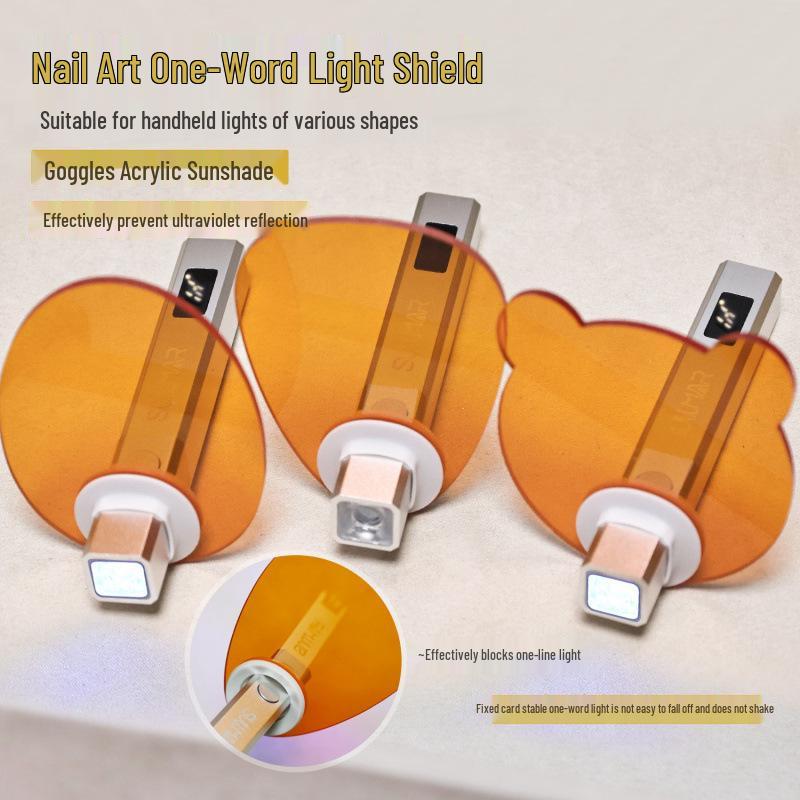 

Nail Art Handheld Light: Eye-Protecting Purple Light Shield with Versatile Lampshades and Orange Light Filter Bear Shield
