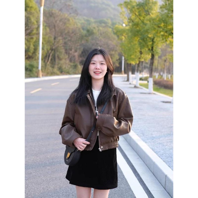 Women's High-End Retro PU Leather Coffee Jacket - Slimming, Windproof, Long Sleeve, Motorcycle Style.