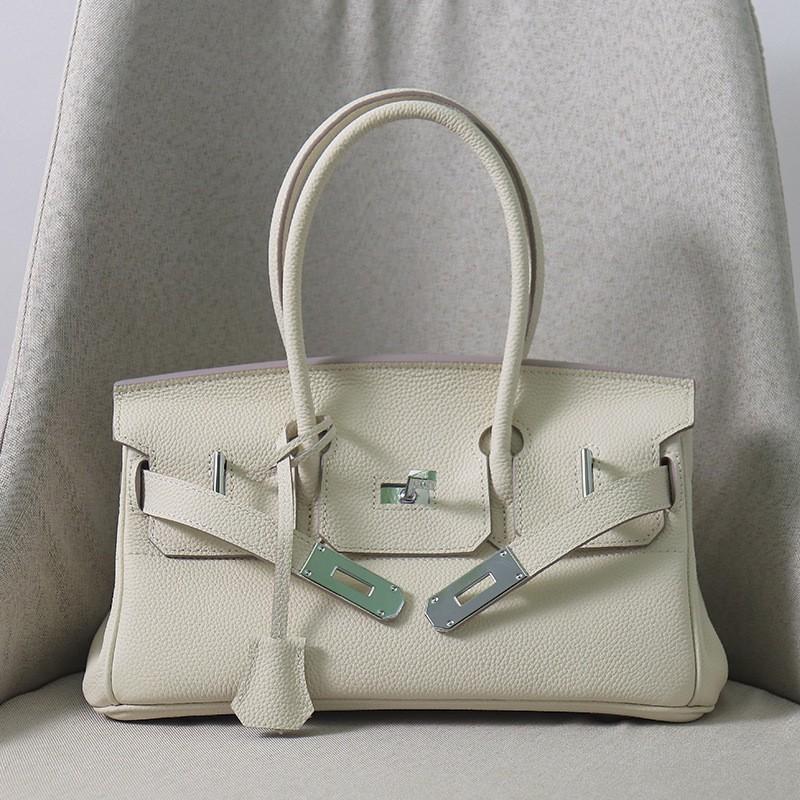 New Togo Top-layer Cowhide Horizontal Platinum Bag Large Capacity Fashion Leather Hand-to-shoulder Commuter Underarm Women's Bag
