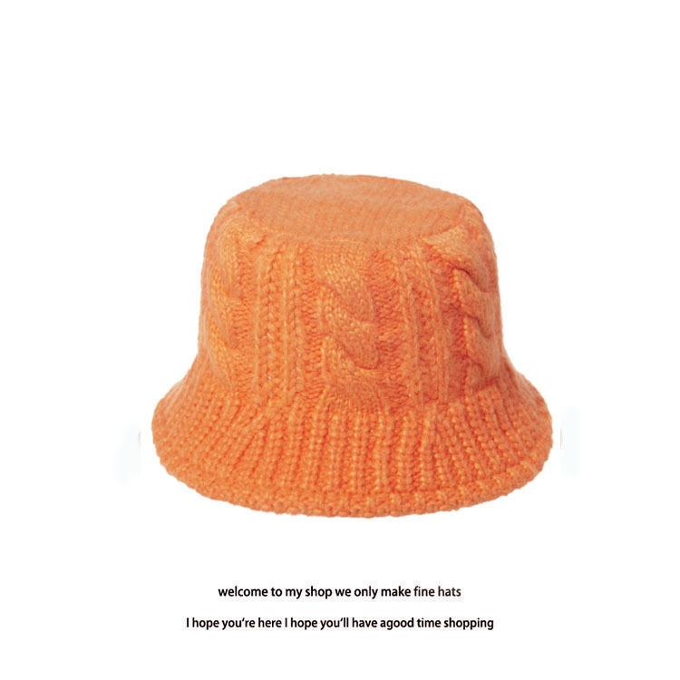 Black knitted hat is suitable for round face warm braided thick wool hat for women in autumn and winter