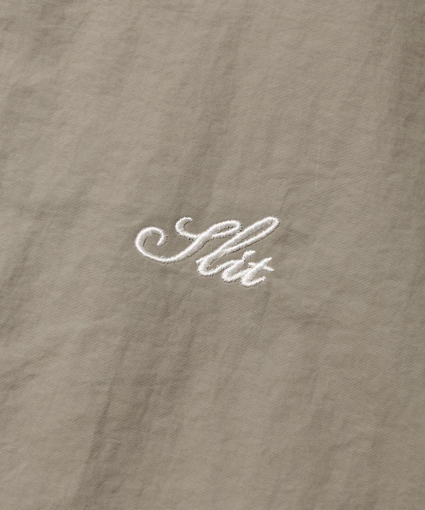 Slit Studio Lettering Windbreaker Jacket Brown