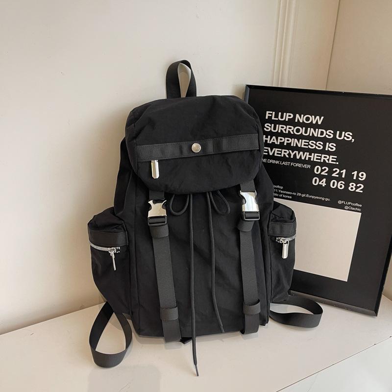 Niche design backpack female college students large-capacity travel backpack Japanese simple commuter high school students schoolbag tide