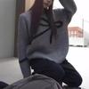 Autumn and winter new versatile design bow knitted sweater women's loose soft waxy round neck pullover