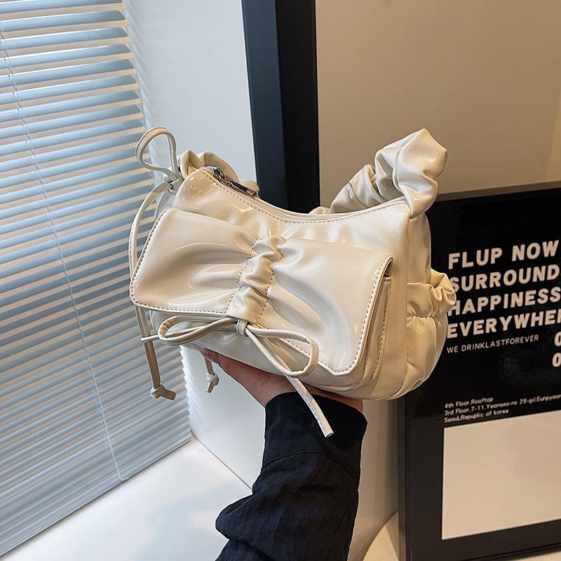 Bag women 2025 new design sense niche fashion messenger bag popular this year pleated armpit small square bag