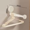 Telescopic No-Punch Suction Cup Wall Rack: Multi-functional Balcony Clothes Storage and Hanger Shelf with Traceless Hooks.