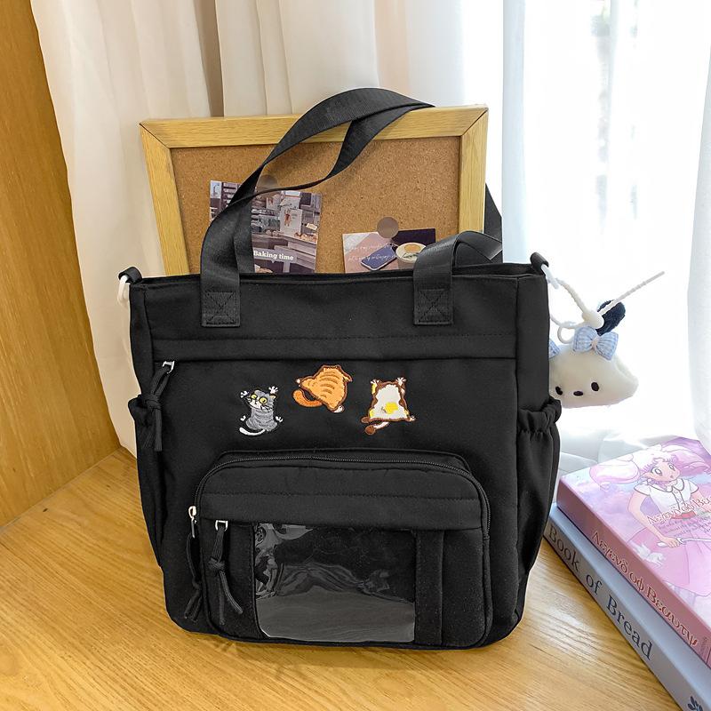 Cute messenger bag women's 2025 new Japanese pain bag large-capacity shoulder bag girl junior high school student portable tote bag