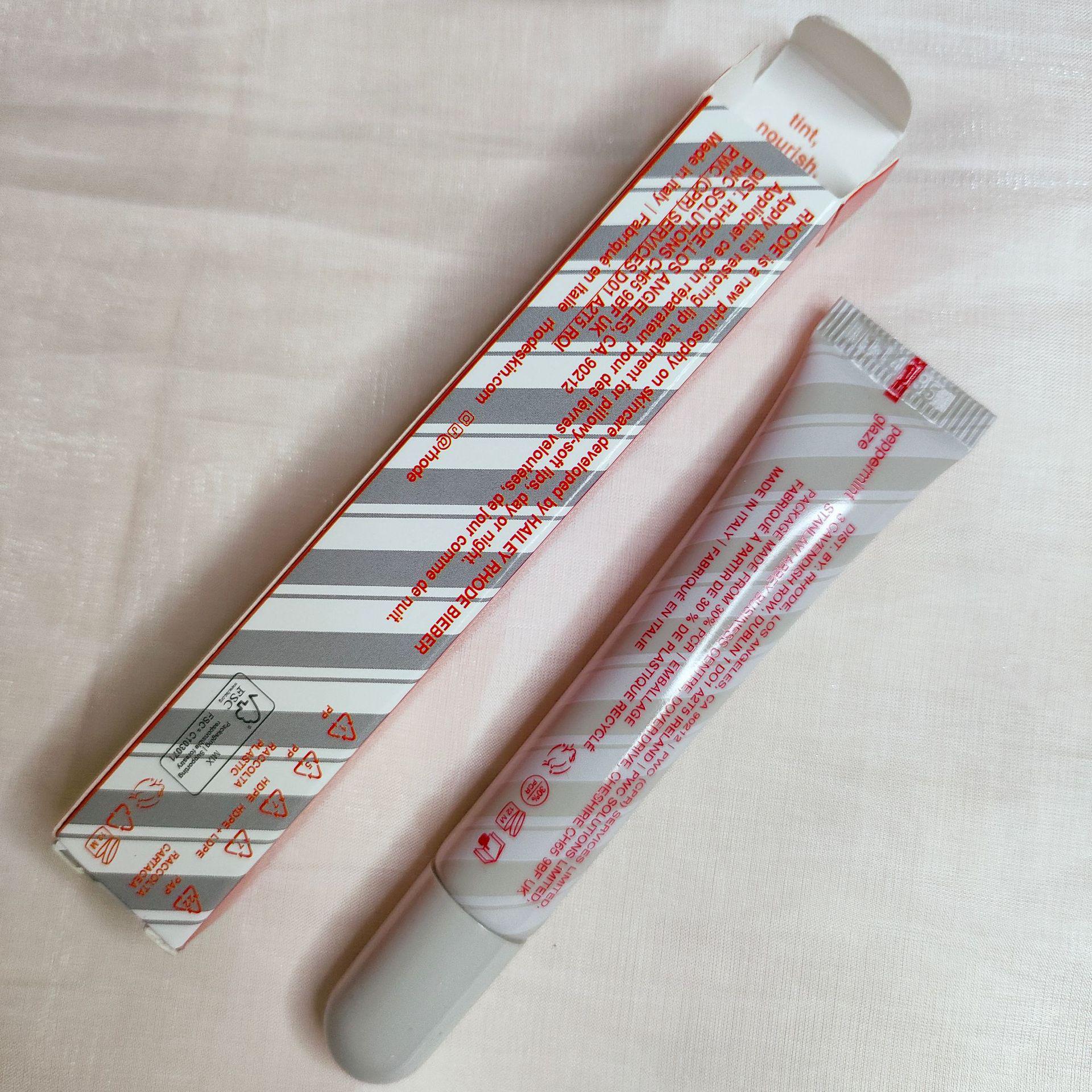 

Rhode Skin от Хейли Персиковый/Гуавовый Желейный Бальзам для Губ - Увлажняющий и Питательный Мягкий Уход за Губами, Новое Цветовое Издание в Чехле для Телефона.