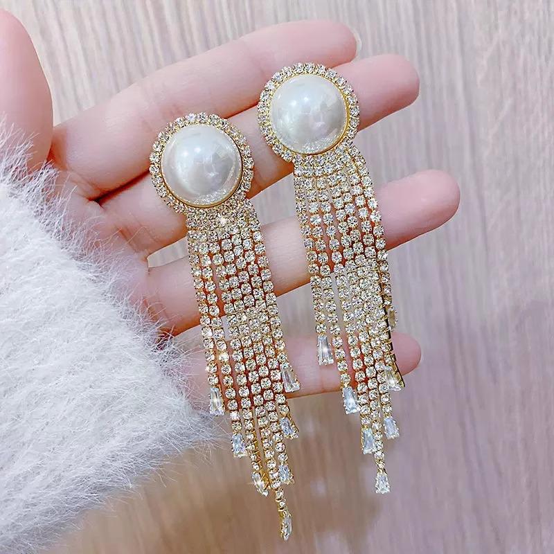 High-End Heart Tassel Earrings: Slimming, Long Dangle for Round Faces - Luxurious and Niche Design