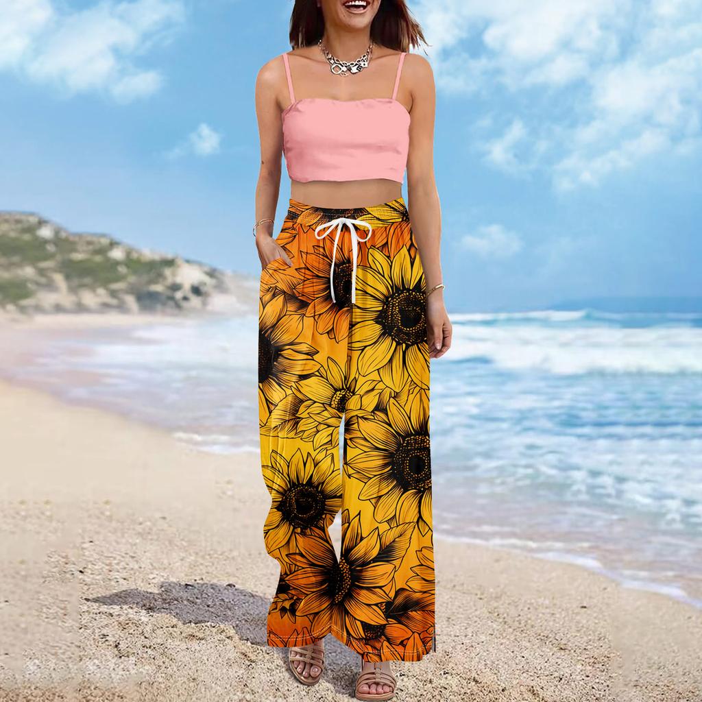 Pantaloni palazzo estivi da donna, stile boho, a vita alta, larghi, con stampa floreale e tasche.