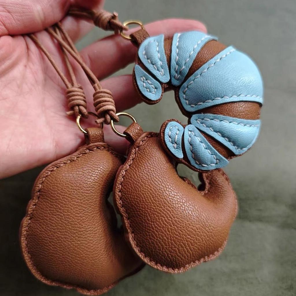 Handmade Leather Croissant Shaped Bag Charm Keychain Accessory for Fashion Enthusiasts Unique Backpack Accessories