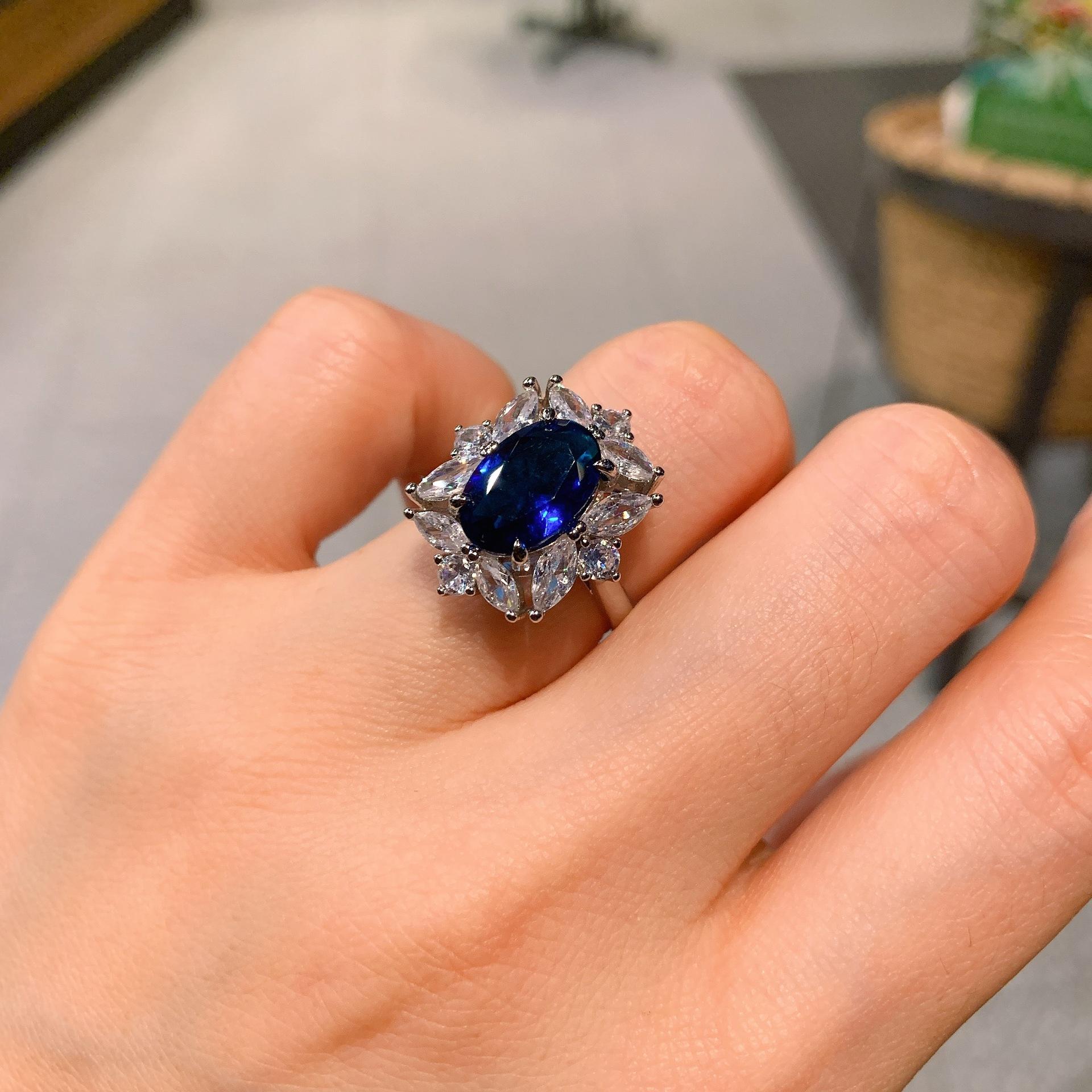 

European and American popular retro wind color treasure simulation sapphire stud earrings pendant ring set main stone 8 * 12 6 * 8