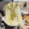 Chemise à manches longues pour femme avec rayures 3D et col polo pour un look décontracté de printemps