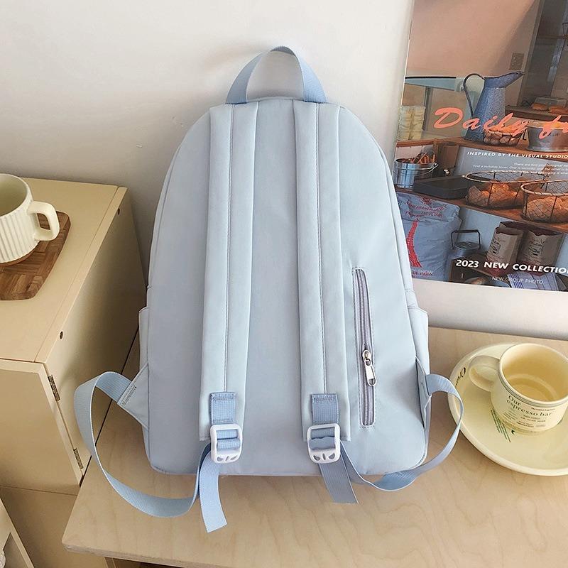 High value, fresh and sweet contrasting color backpack, light and multi-pocket backpack for primary and secondary school students