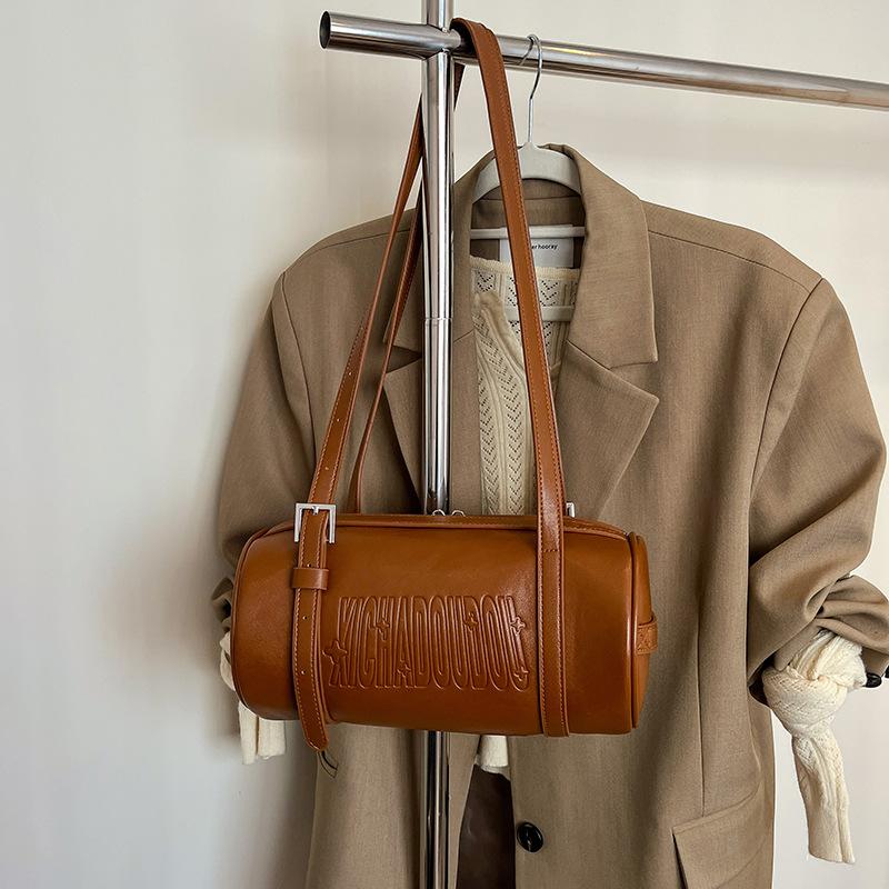 

Popular wholesale retro Maillard texture portable soft leather cylindrical bag women s versatile simple multi-back pillow bag