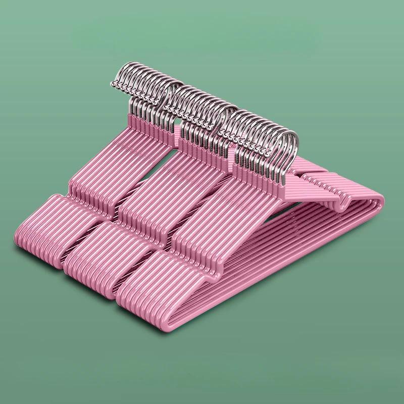 

1 шт. Новая одежда противоскользящая вешалка бытовая вешалка дугообразный дизайн пластиковая широкая плечевая полукруглая вешалка бесшовное висение 1pc розовый