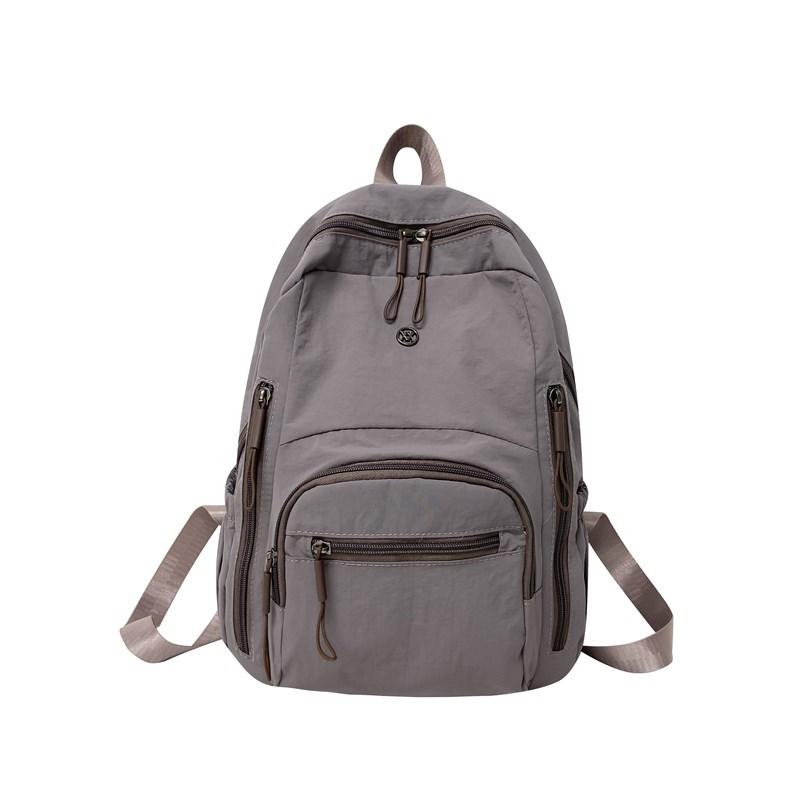 Lightweight schoolbag female solid color water-proof multi-pocket computer commuting backpack college student class travel backpack