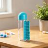 Tragbare Pillendose Wasserbecher 2-in-1 Wasserflasche mit 7-Tage-Pillenbox Einfache Montage Tägliche Pillenerinnerungstasse für Reisen Zuhause Arbeit Outdoor-Nutzung