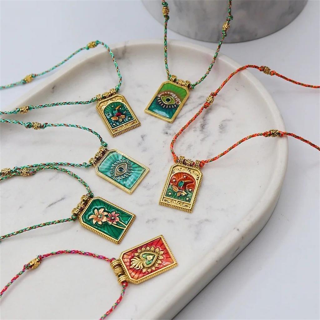 Hot selling artistic retro style tarot card heart eye flame pendant necklace for women's fashion gold-plated color preservation