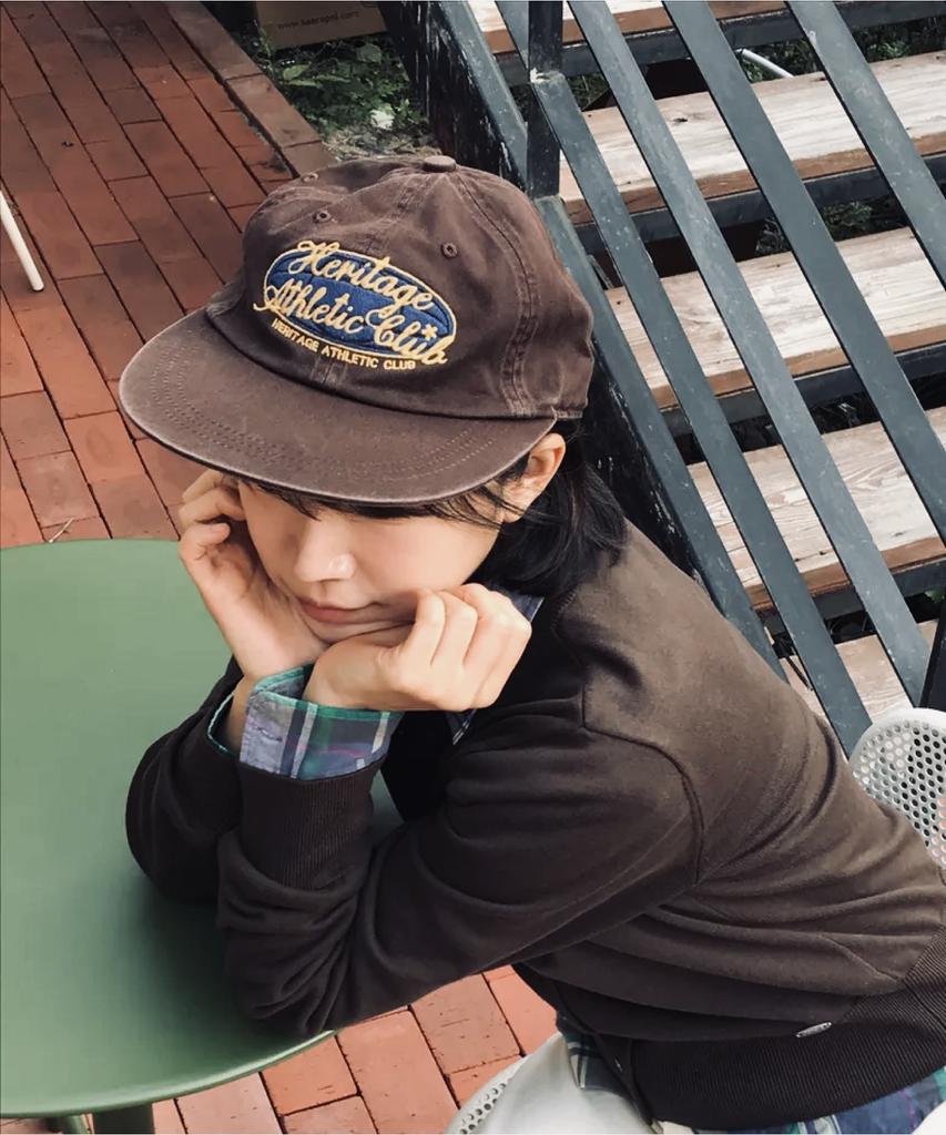 Yunibeoseugameonteu Universe Sign Long Bill Washed Cap_Brown